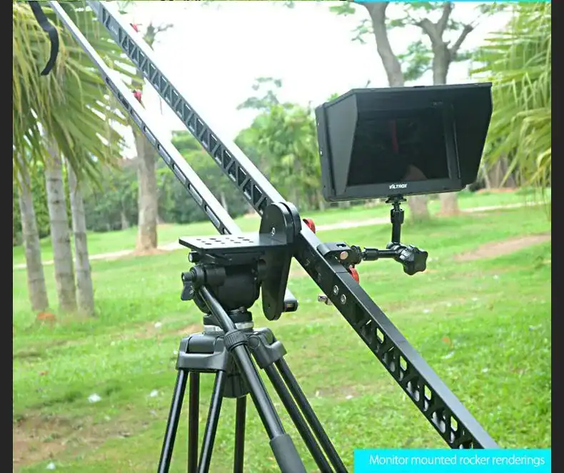 Professional camera slider with monitor mount for cinematic shots and dynamic filming.