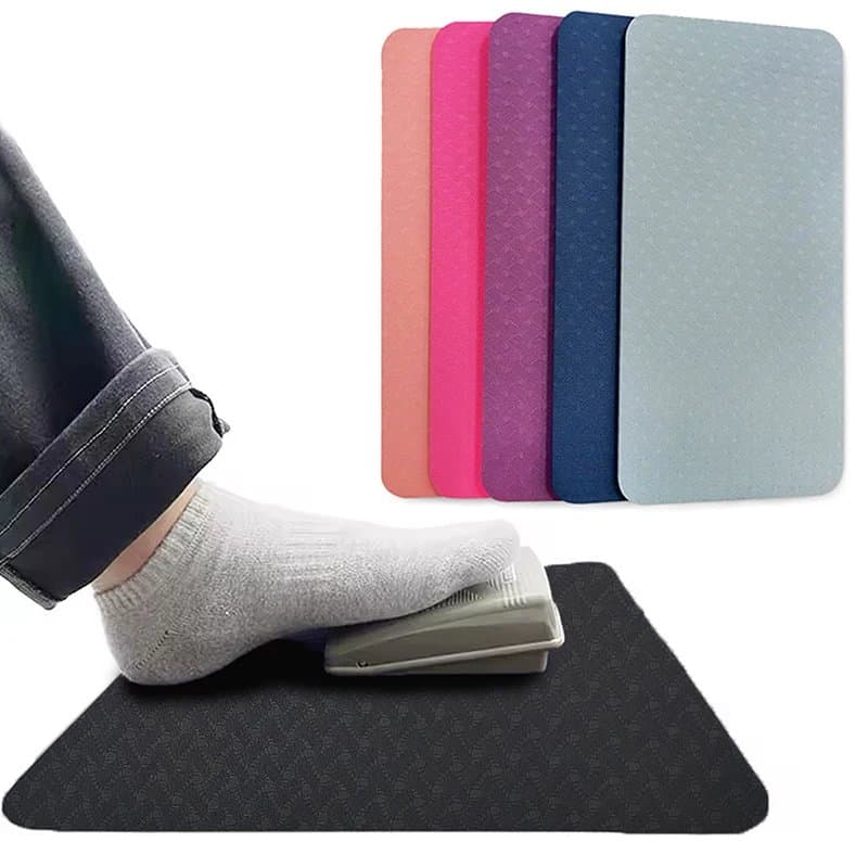 Colorful yoga mats with textured surfaces for exercise and fitness routines.
